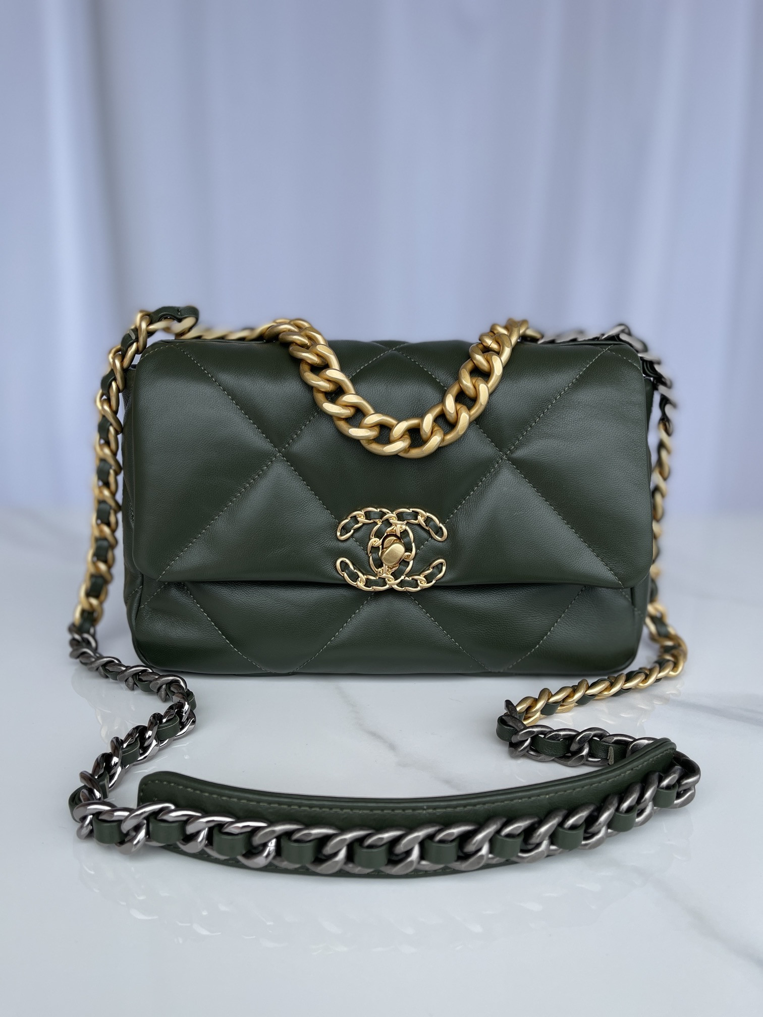 Ch*el 19 handbag shiny leather, gold-tone, silver-tone & ruthenium-finish metal dark green 6.2 × 10.1 × 3.5 in